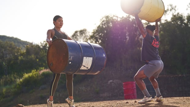 Athletes training outdoors in Reebok apparel.